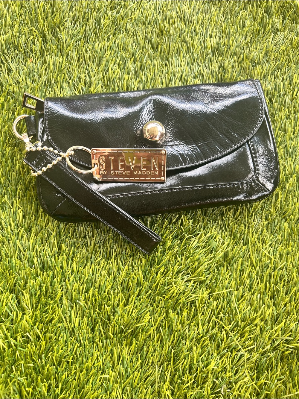 Steven by Steve Madden Black Patent Wristlet with Gold Plaque